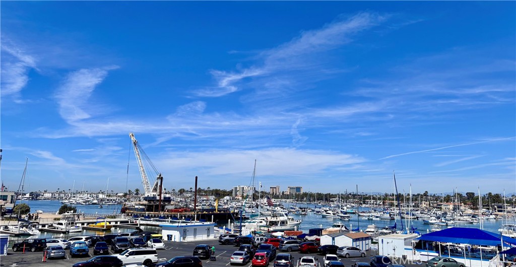 Wake to your Morning Coffee and the crisp Ocean Air with these views from your private balcony. - 1510 W Balboa Blvd I, Newport Beach CA 92663 - photo 1