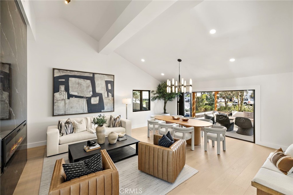 Grande Living room seating area that opens to front patio area - 1700 Port Ashley, Newport Beach CA 92660 - photo 10