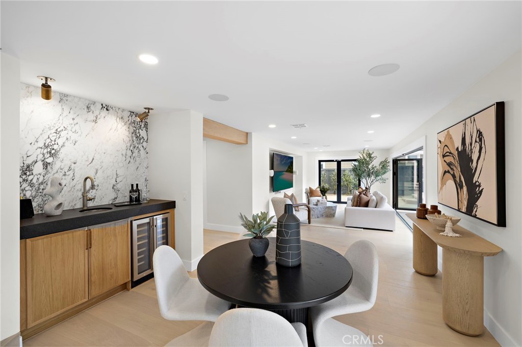 Secondary dining area, custom chic bar and TV room - 1700 Port Ashley, Newport Beach CA 92660 - photo 15