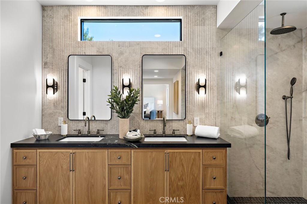 Fluted marble backsplash on double solid oak vanity creating a spa-like feel - 1700 Port Ashley, Newport Beach CA 92660 - photo 29