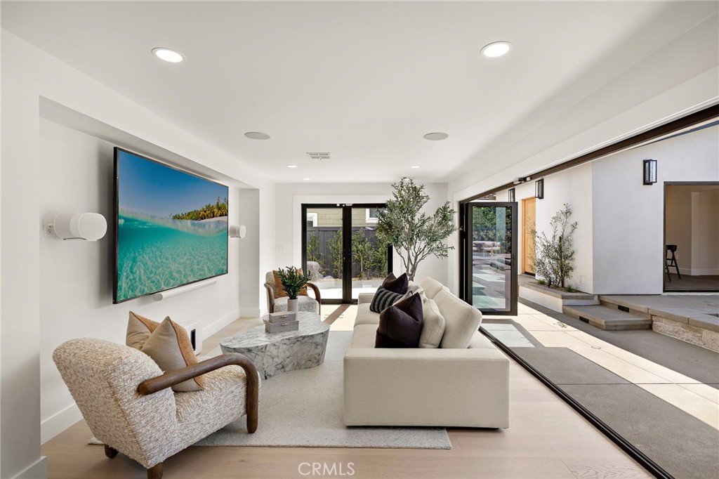 Entertainment room eqipped with 100 inch TV, Sonos sound system & pool system- all run on an ipad - 1700 Port Ashley, Newport Beach CA 92660 - photo 40