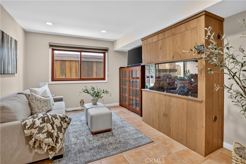 downstairs bedroom complete with built in fish tack - 1706 E Ocean Boulevard, Newport Beach CA 92661 - photo 11