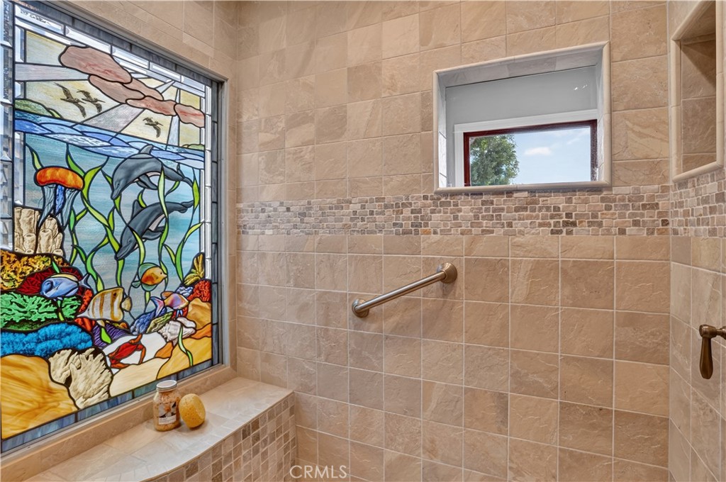 Beautiful stained-glass window in shower - 1706 E Ocean Boulevard, Newport Beach CA 92661 - photo 35
