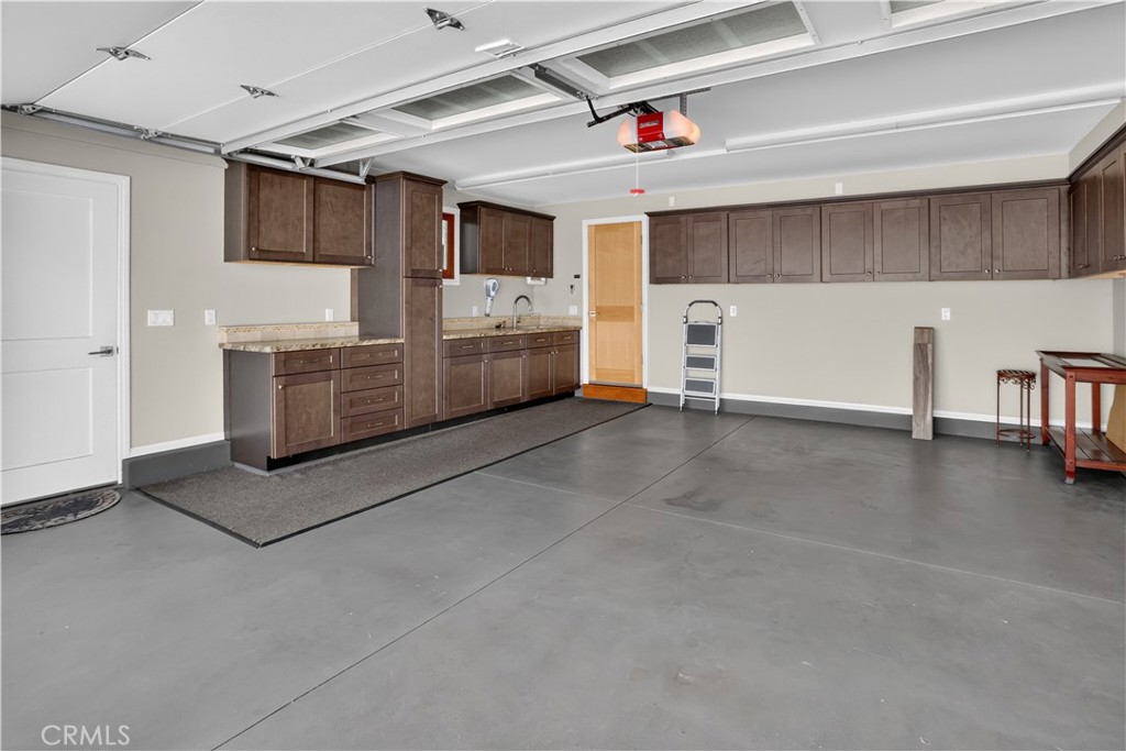finished garage with cabinets,counters, sink & direct access - 1706 E Ocean Boulevard, Newport Beach CA 92661 - photo 42