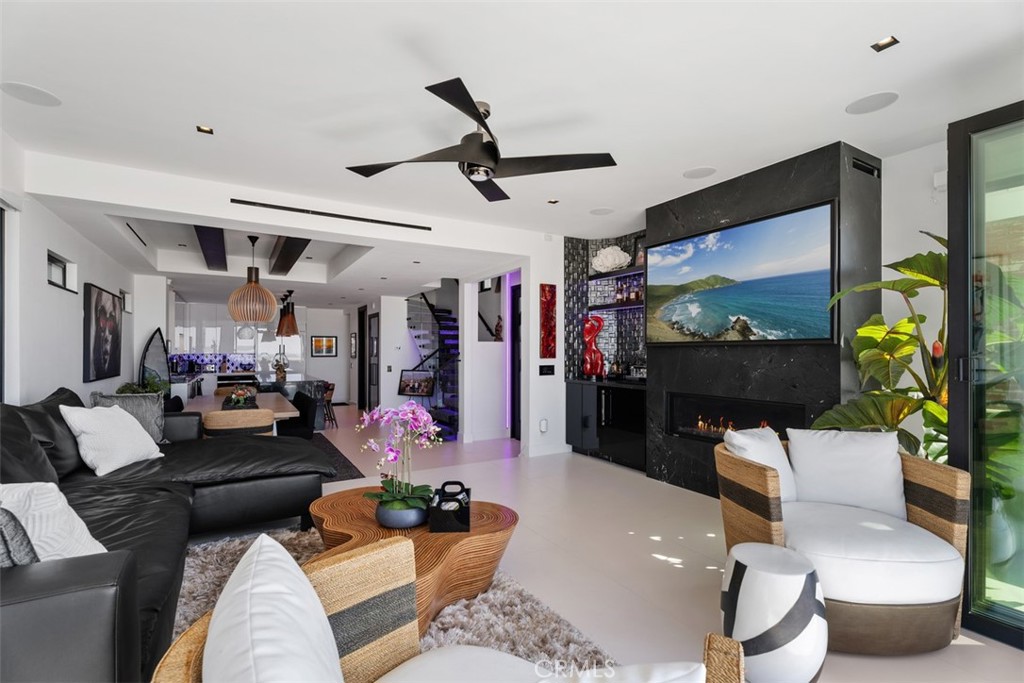 Living room opening to the beach - 1904 W Oceanfront, Newport Beach CA 92663 - photo 8