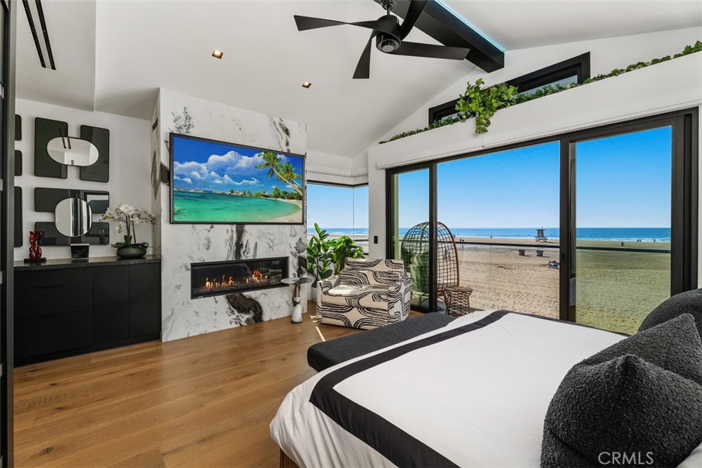 Primary bedroom with balcony - 1904 W Oceanfront, Newport Beach CA 92663 - photo 19