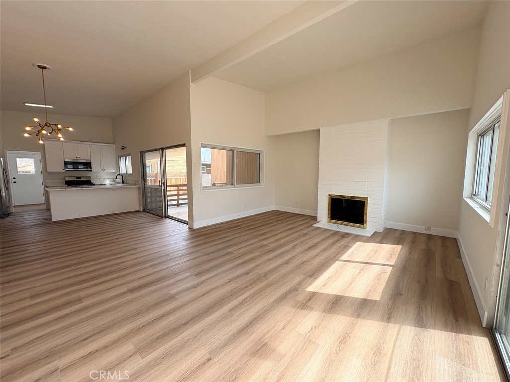 Large living room with vaulted ceilings - 20452 SW Cypress, Newport Beach CA 92660 - photo 10