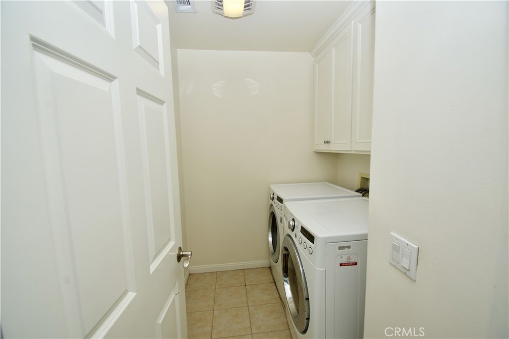 Upstairs laundry room - 20462 Savanna, Newport Beach CA 92660 - photo 17