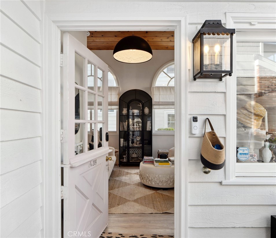 Enter the luxurious curated relaxed home. - 209 Diamond Avenue, Newport Beach CA 92662 - photo 10