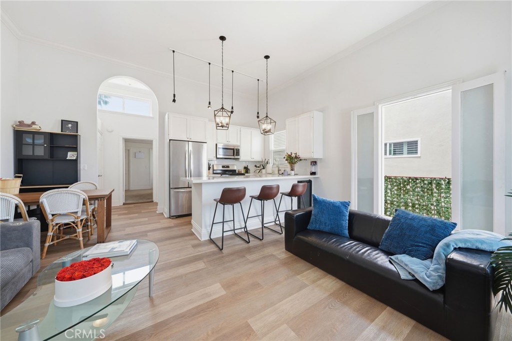 Unit D: Kitchen with loft area. - 2202 W Oceanfront, Newport Beach CA 92663 - photo 18