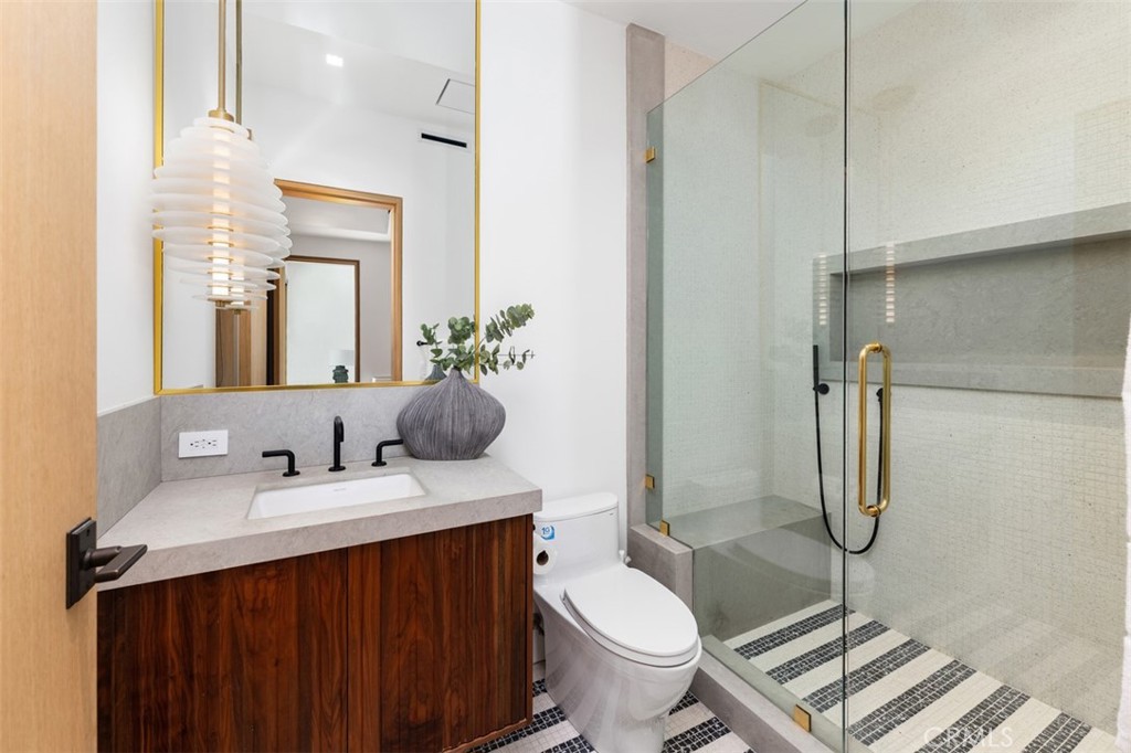 Third en-suite with custom Italian tile and light fixture - 2398 Redlands Drive, Newport Beach CA 92660 - photo 22