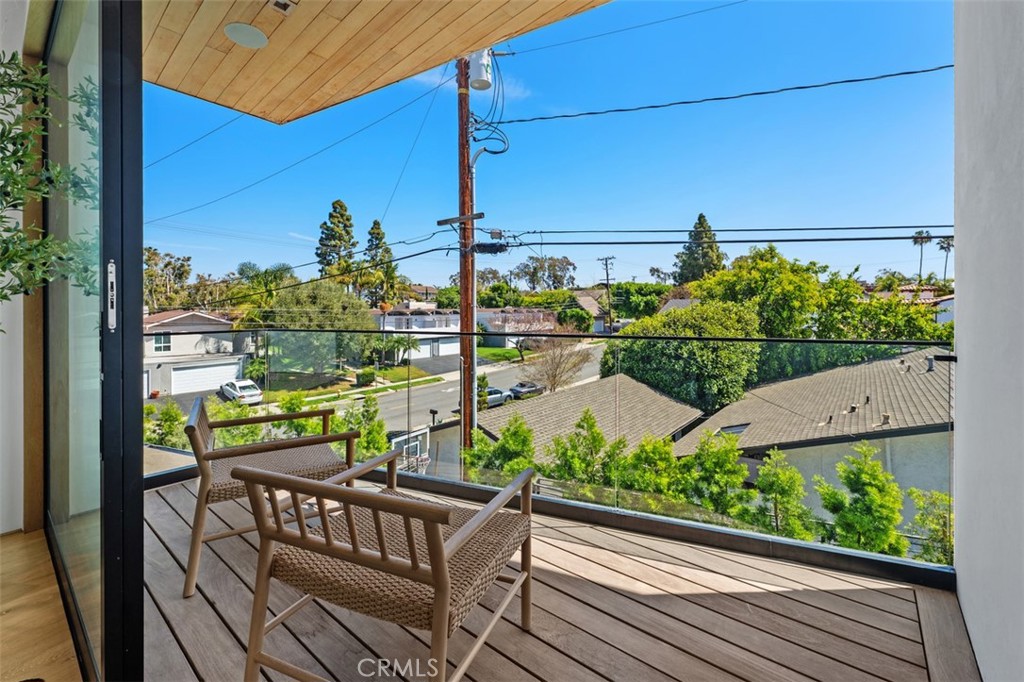 Relaxing balcony off primary suite perfect for enjoying your favorite drink - 2398 Redlands Drive, Newport Beach CA 92660 - photo 29