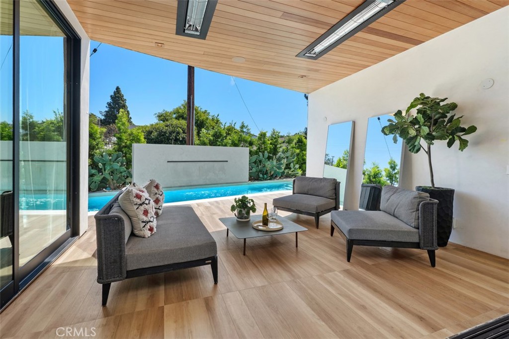 Outdoor patio to enjoy the pool waterfall - 2398 Redlands Drive, Newport Beach CA 92660 - photo 34