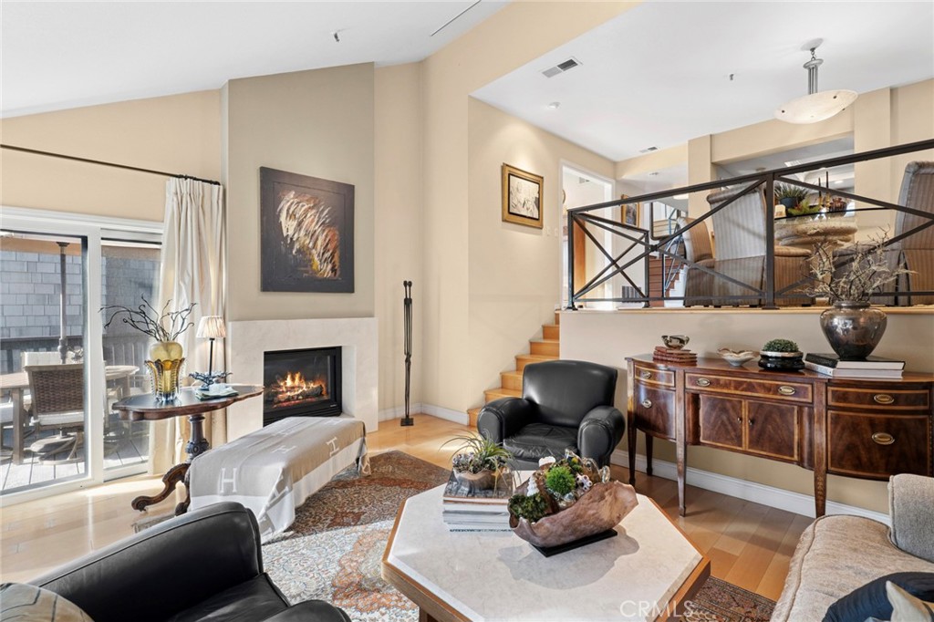 Living Room is anchored by a floor-to-ceiling fireplace - 24 Canyon Island Drive, Newport Beach CA 92660 - photo 1