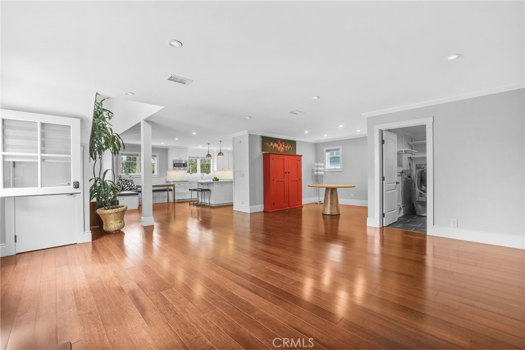 Living room facing kitchen and dining room - 2520 Cliff Drive, Newport Beach CA 92663 - photo 35