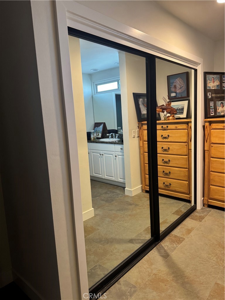 Primary Reach In Closet - 2522 University, Newport Beach CA 92660 - photo 12