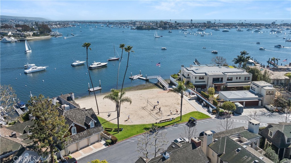 Enjoy the bay breeze and the beautiful views from the private community beach. - 2602 Circle Drive, Newport Beach CA 92663 - photo 1