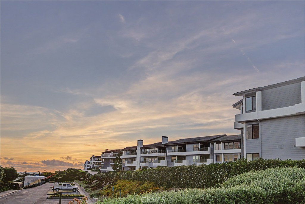 Enjoy spectacular Newport sunsets from your own home. - 280 Cagney Lane 207, Newport Beach CA 92663 - photo 26
