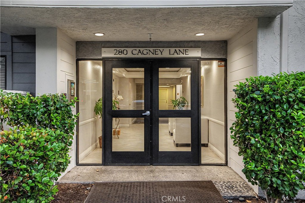 Building has secure entry. - 280 Cagney Lane 207, Newport Beach CA 92663 - photo 29