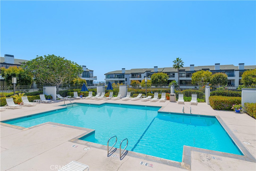 Larger of two pools - 280 Cagney Lane 207, Newport Beach CA 92663 - photo 37