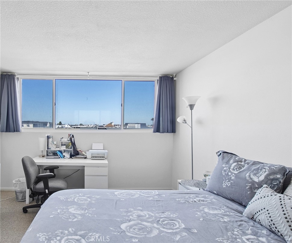 Second bedroom with bay view - 310 Fernando Street 208, Newport Beach CA 92661 - photo 16