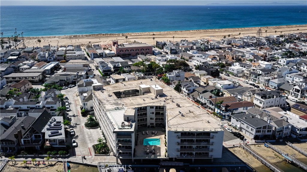 Aerial of building and pool - 310 Fernando Street 208, Newport Beach CA 92661 - photo 27