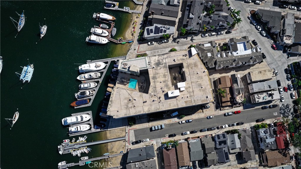 Overhead aerial of pool and docks - 310 Fernando Street 208, Newport Beach CA 92661 - photo 29