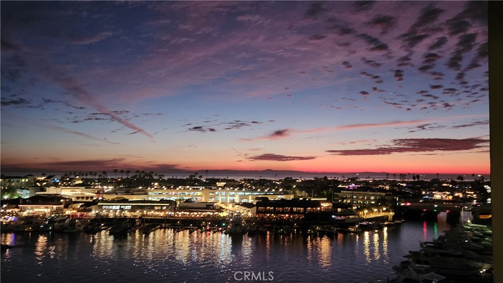 Evening view of Catalina at Sunset - 3121 W. Coast Hwy 7A 7B, Newport Beach CA 92663 - photo 2