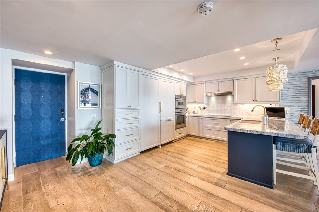 Entry and Kitchen - 3121 W. Coast Hwy 7A 7B, Newport Beach CA 92663 - photo 3