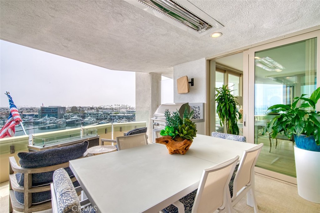 Outdoor eating area with heater - 3121 W. Coast Hwy 7A 7B, Newport Beach CA 92663 - photo 22