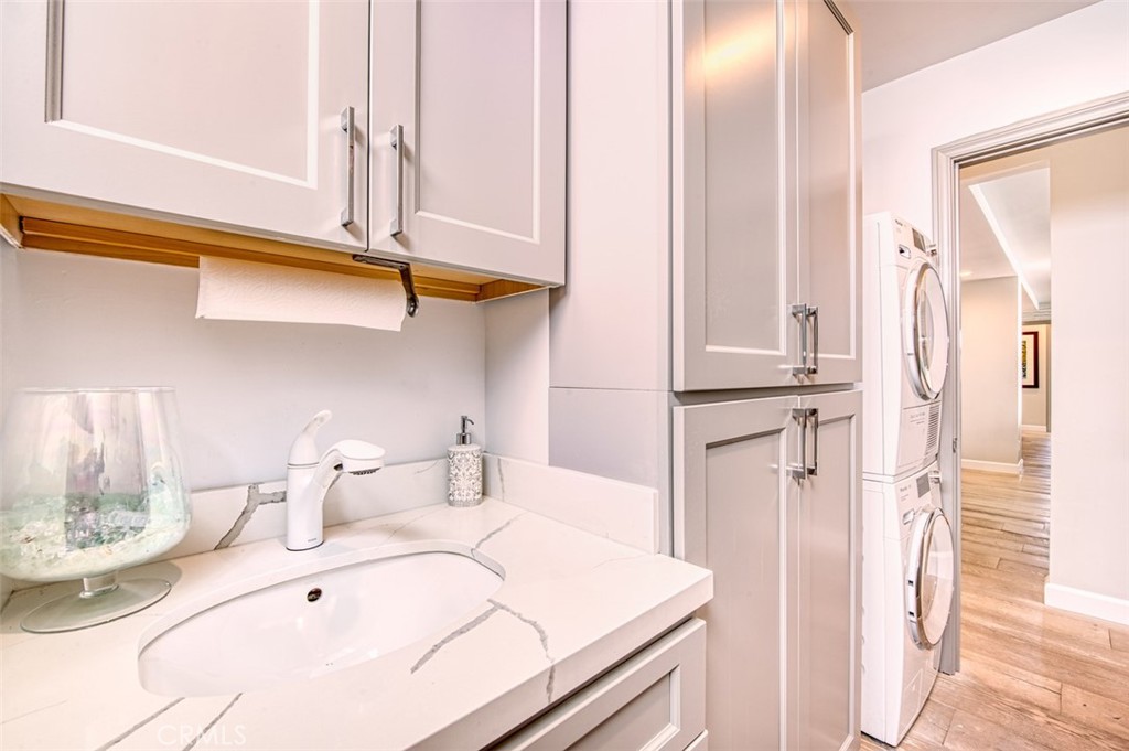 Laundry room with sink - 3121 W. Coast Hwy 7A 7B, Newport Beach CA 92663 - photo 26