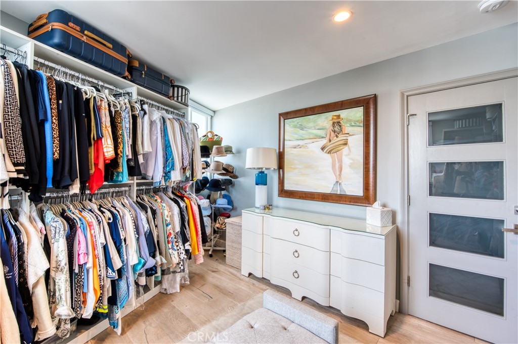 Rear bedroom is used as a closet and has a separate closet. - 3121 W. Coast Hwy 7A 7B, Newport Beach CA 92663 - photo 28
