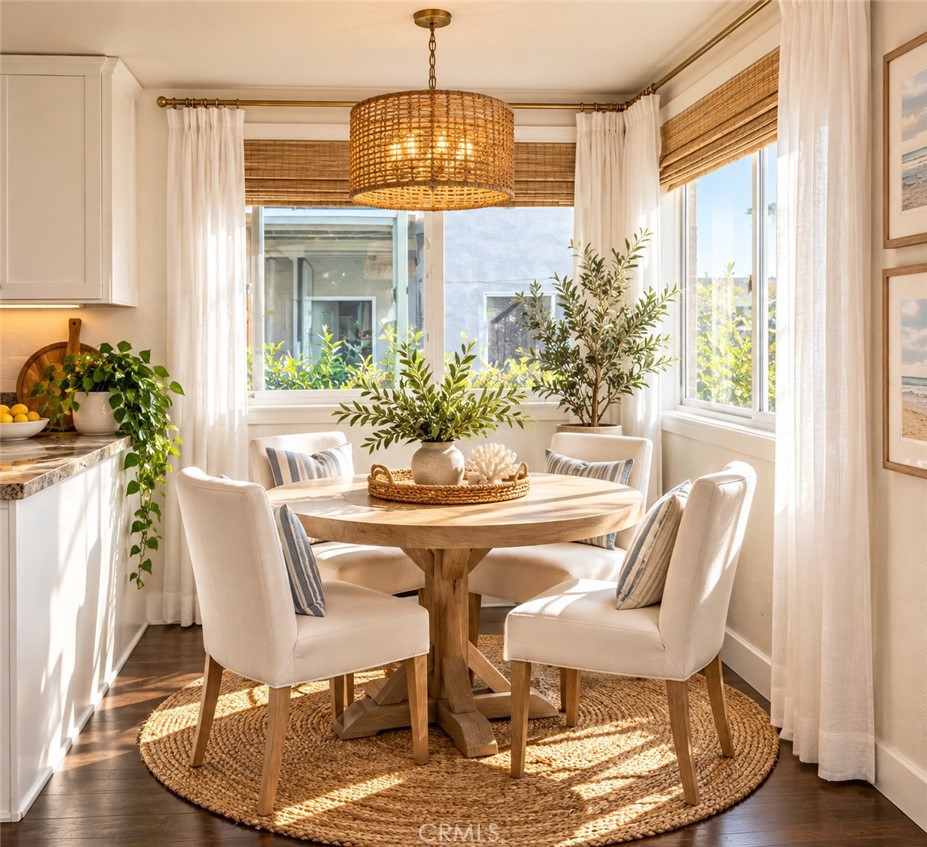 Dining area. the table is AI staging - 3209 Clay Street A, Newport Beach CA 92663 - photo 7