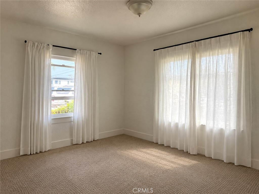 master bedroom unfurnished. picture taken with phone. - 3209 Clay Street A, Newport Beach CA 92663 - photo 19