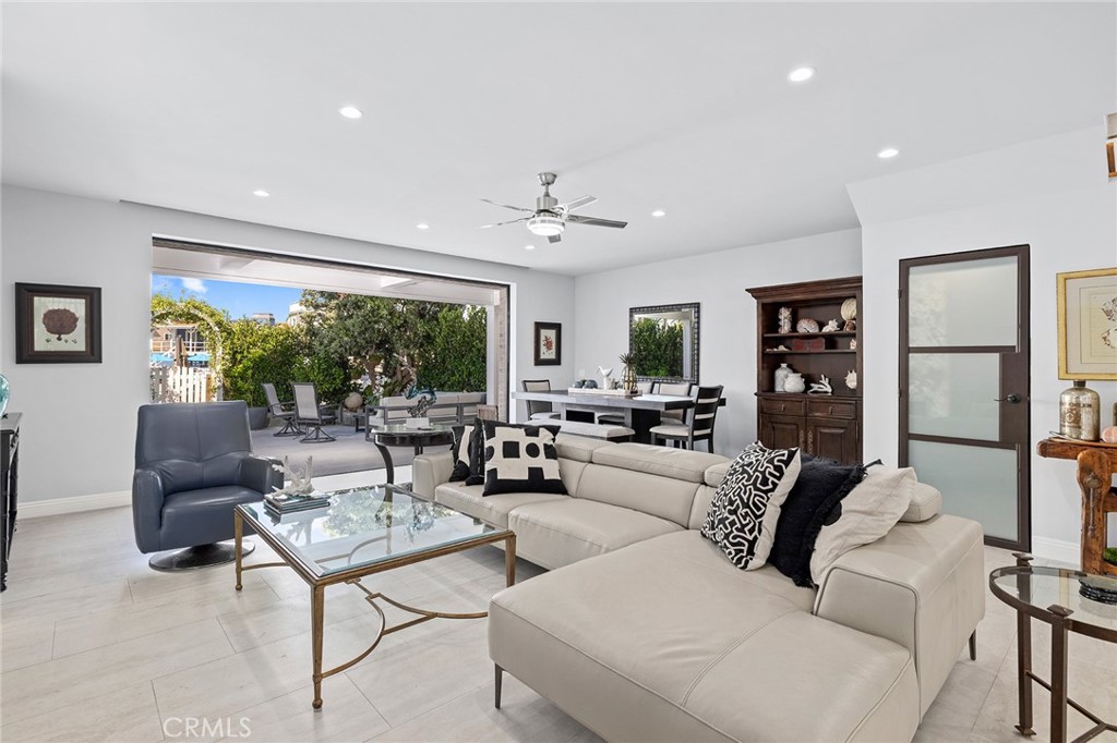 Living room with Fleetwood pocket doors - 3304 Marcus, Newport Beach CA 92663 - photo 1