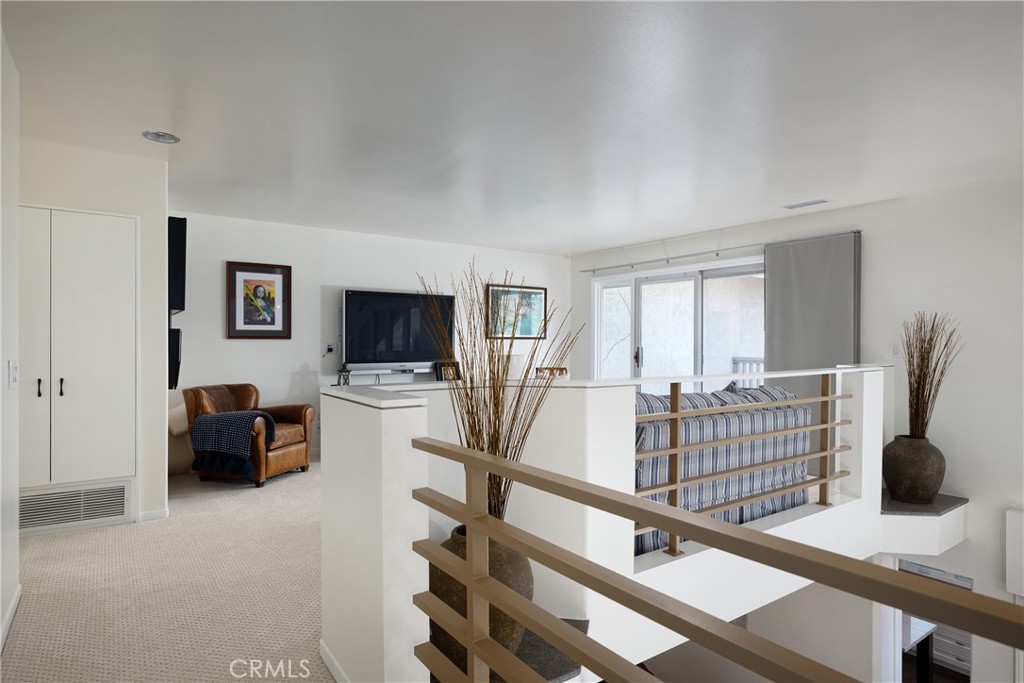 Upper-Level Loft: Versatile loft provides additional living or media space with an open railing overlooking the level be - 36 Vienna, Newport Beach CA 92660 - photo 24