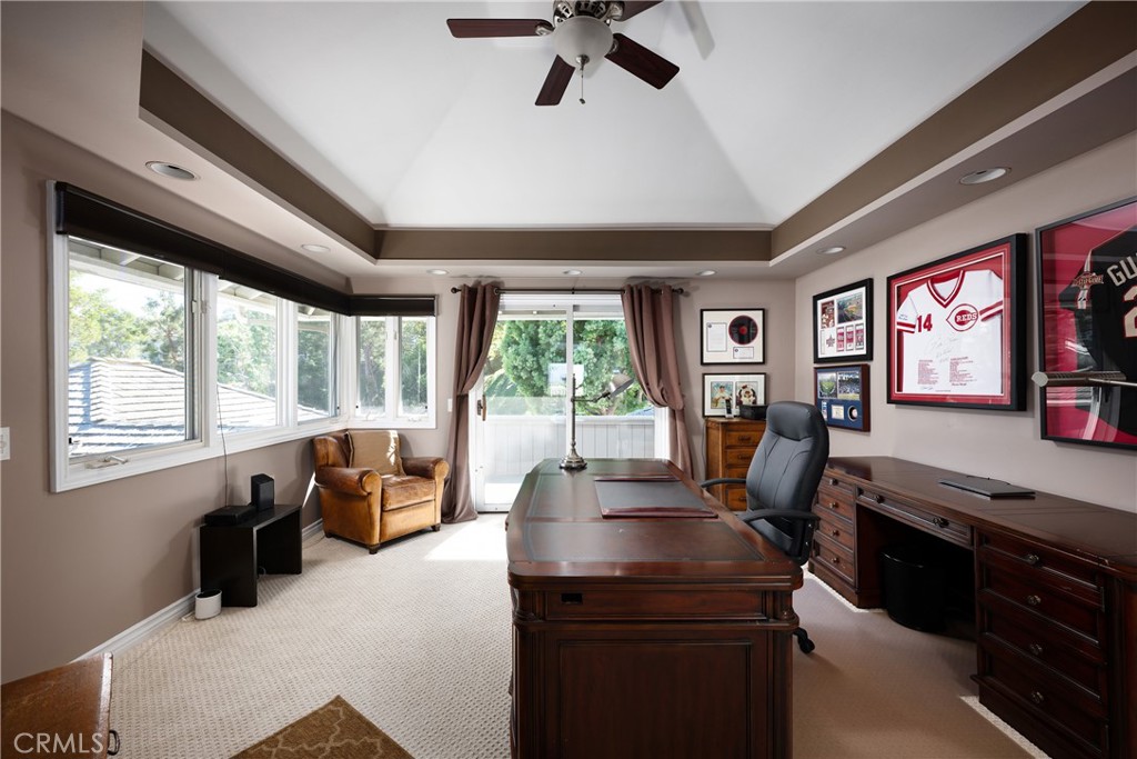 Bedroom/Home Office: Spacious home office features a tray ceiling with recessed lighting, abundant windows, and direct a - 36 Vienna, Newport Beach CA 92660 - photo 27