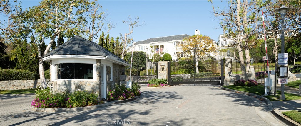 Gated Community Entrance: Harbor Ridge entrance features a staffed gatehouse, decorative wrought-iron gates, stone accen - 36 Vienna, Newport Beach CA 92660 - photo 45