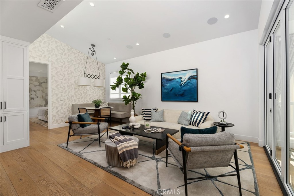 Family Room with Dining Nook and Banquette seating - 418 1/2 Larkspur, Newport Beach CA 92625 - photo 6
