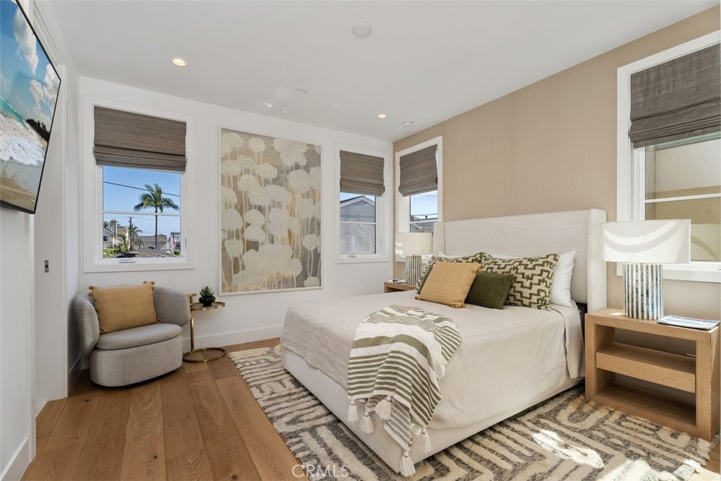 Primary bedroom located on second floor with engineered hardwood white oak flooring - 418 1/2 Larkspur, Newport Beach CA 92625 - photo 16