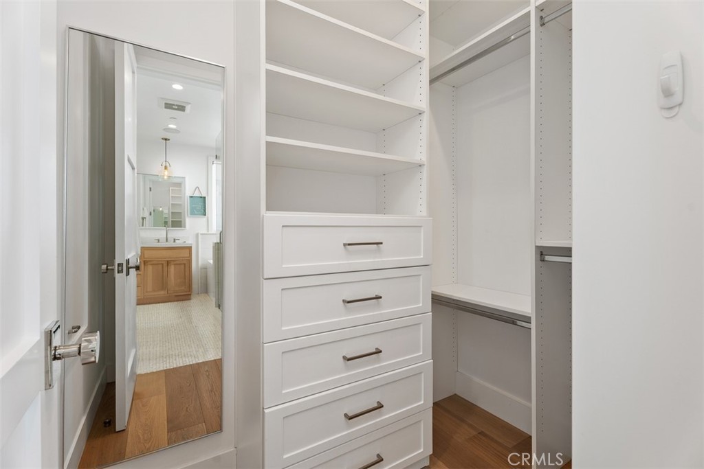 Primary Closet with Builtins - 418 1/2 Larkspur, Newport Beach CA 92625 - photo 19