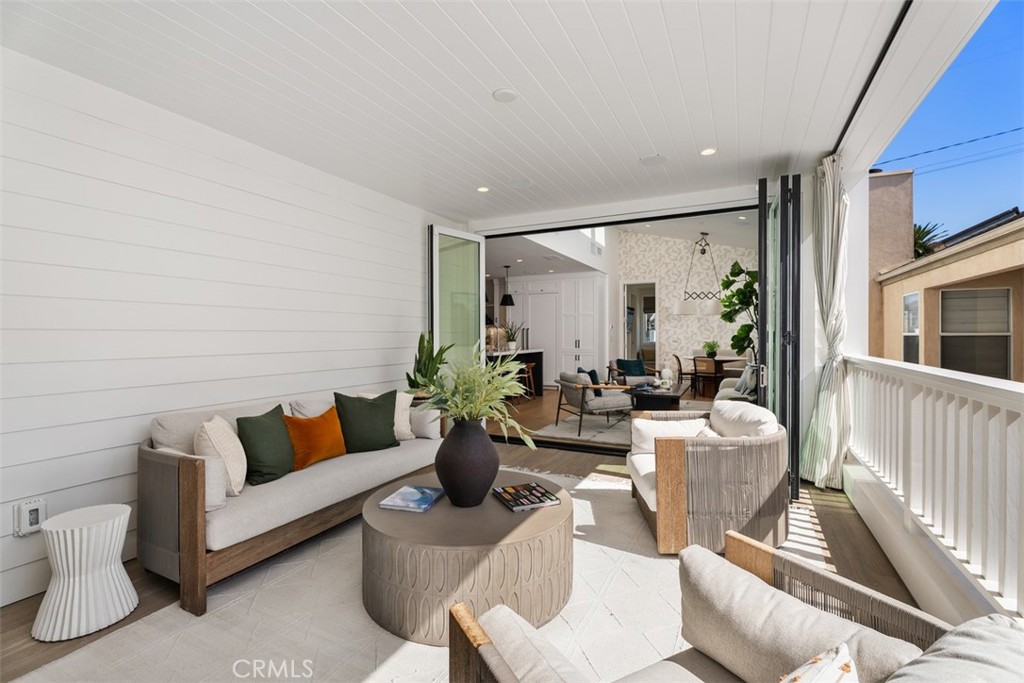 Seamless Indoor /Outdoor living from second floor patio looking into family room - 418 1/2 Larkspur, Newport Beach CA 92625 - photo 23