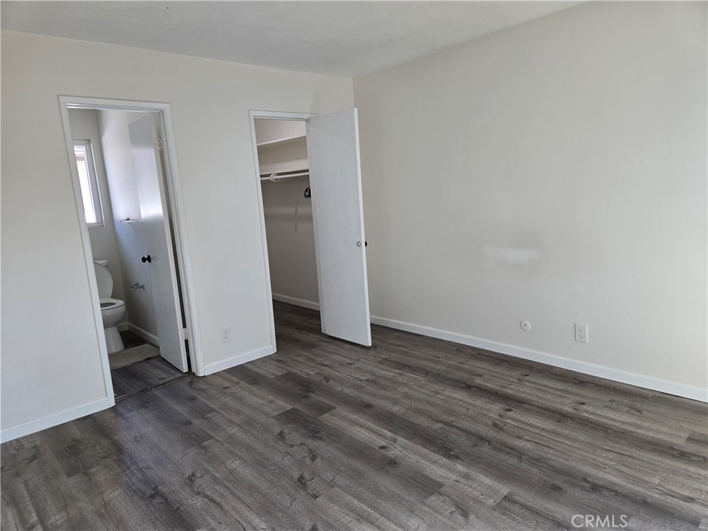 Main Bedroom with walk-in closet and attached Bathroom with walk-in stall shower - 4233 Hilaria, Newport Beach CA 92663 - photo 5