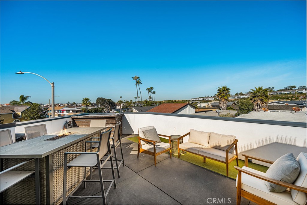 Rooftop deck with BBQ and firetable - 4405 Channel Place, Newport Beach CA 92663 - photo 48