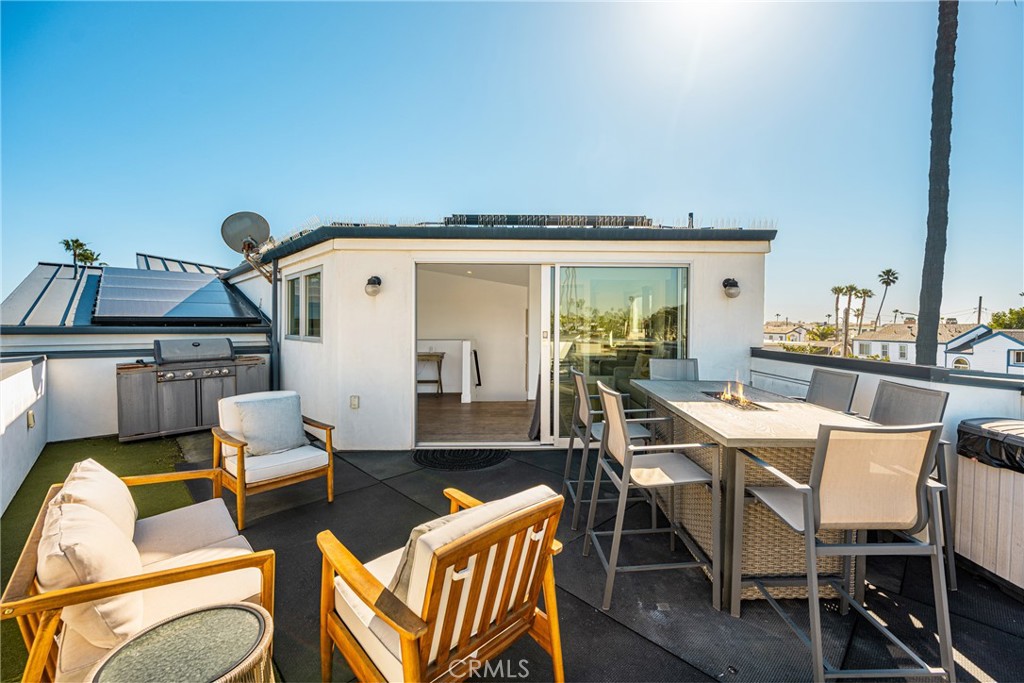 Rooftop deck with BBQ and firetable - 4405 Channel Place, Newport Beach CA 92663 - photo 52