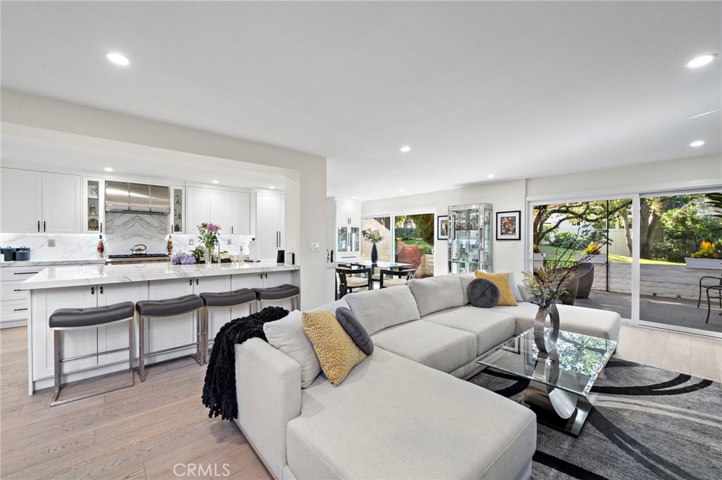 A large open space living area for all your entertaining needs & beautiful, private view. - 526 Vista Grande, Newport Beach CA 92660 - photo 7
