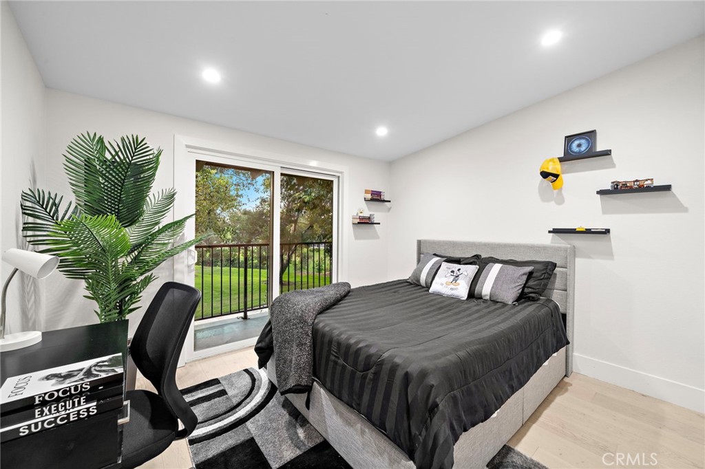 Bedroom with balcony and view of Mature trees & lush greenbelt & walking trails - 526 Vista Grande, Newport Beach CA 92660 - photo 11