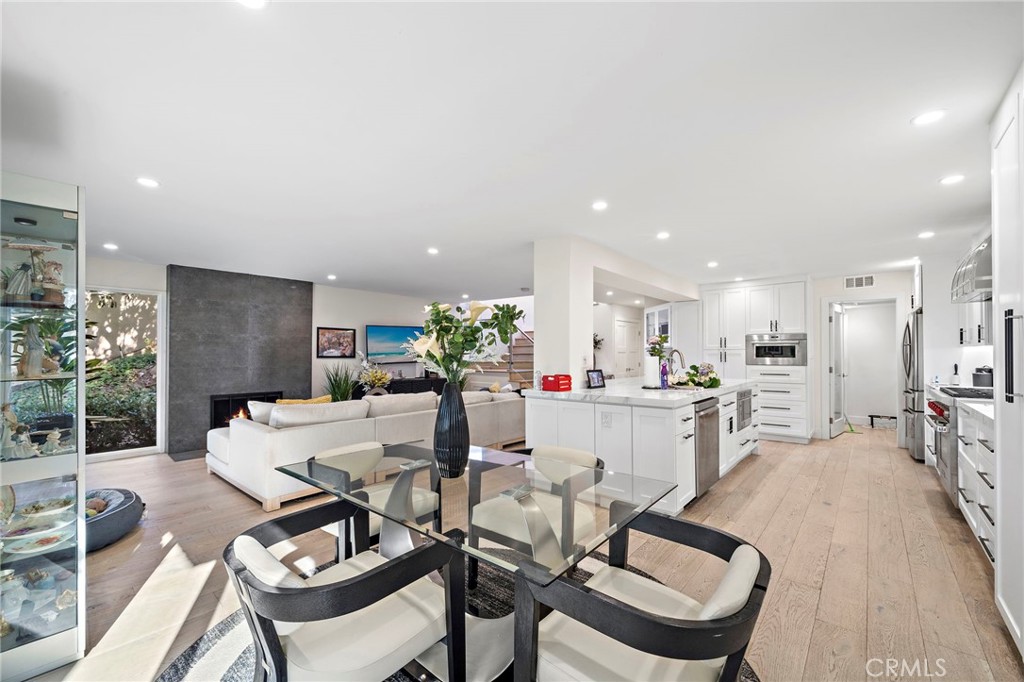 Full view of home - indoor/outdoor living for entertaining - enjoy the private end unit with a lush green view of mature - 526 Vista Grande, Newport Beach CA 92660 - photo 15