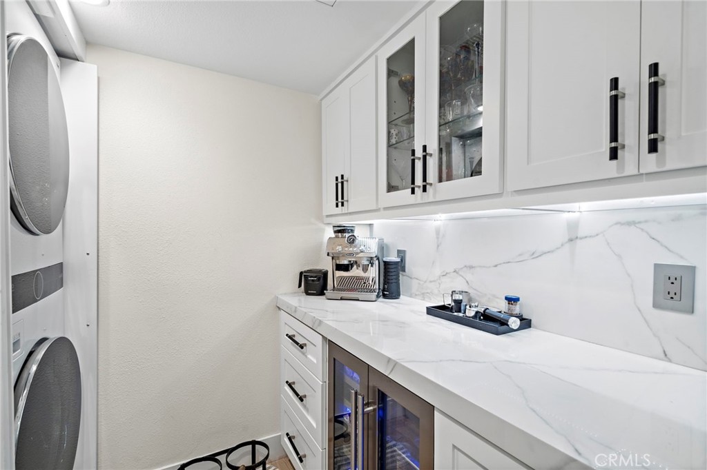 Wine/Champagne Coffee Bar, wine/beverage refrigerator, with sink & doors to hide washer & dryer - 526 Vista Grande, Newport Beach CA 92660 - photo 16