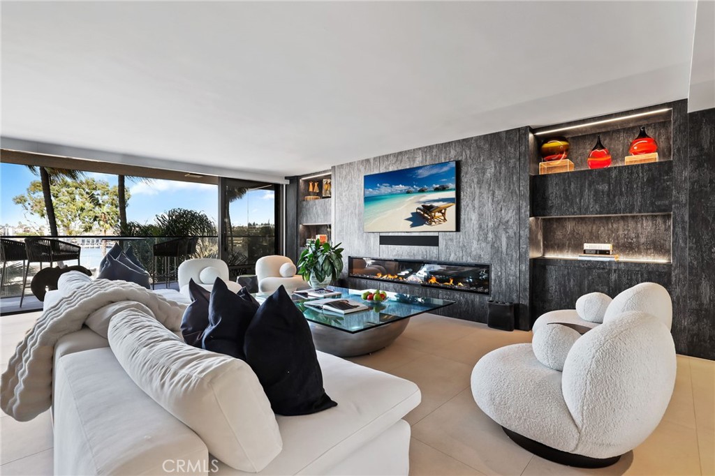 Living room with slider patio door - 601 Lido Park, Newport Beach CA 92663 - photo 3